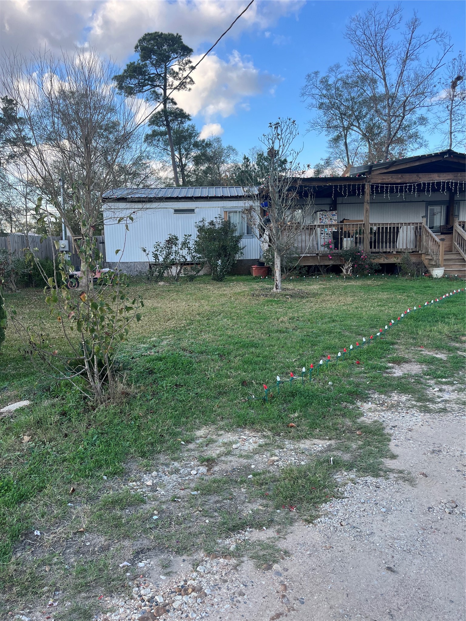 7967 Addison Belle Drive Conroe, TX 77306 - Photo 2 of 10 a view of a house with a yard and sitting area