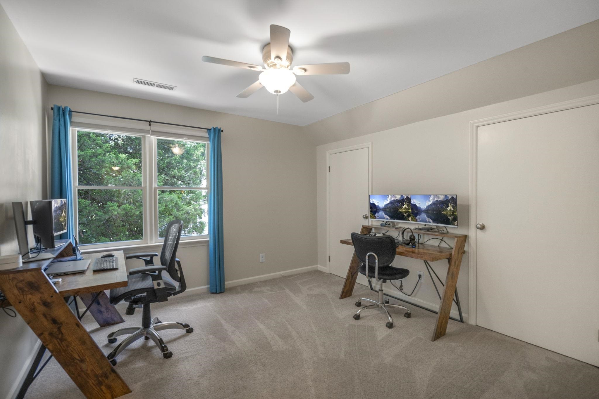 108 Rushingwater Drive Cary, NC 27513 - Photo 14 of 37 a view of a workspace with furniture and a window