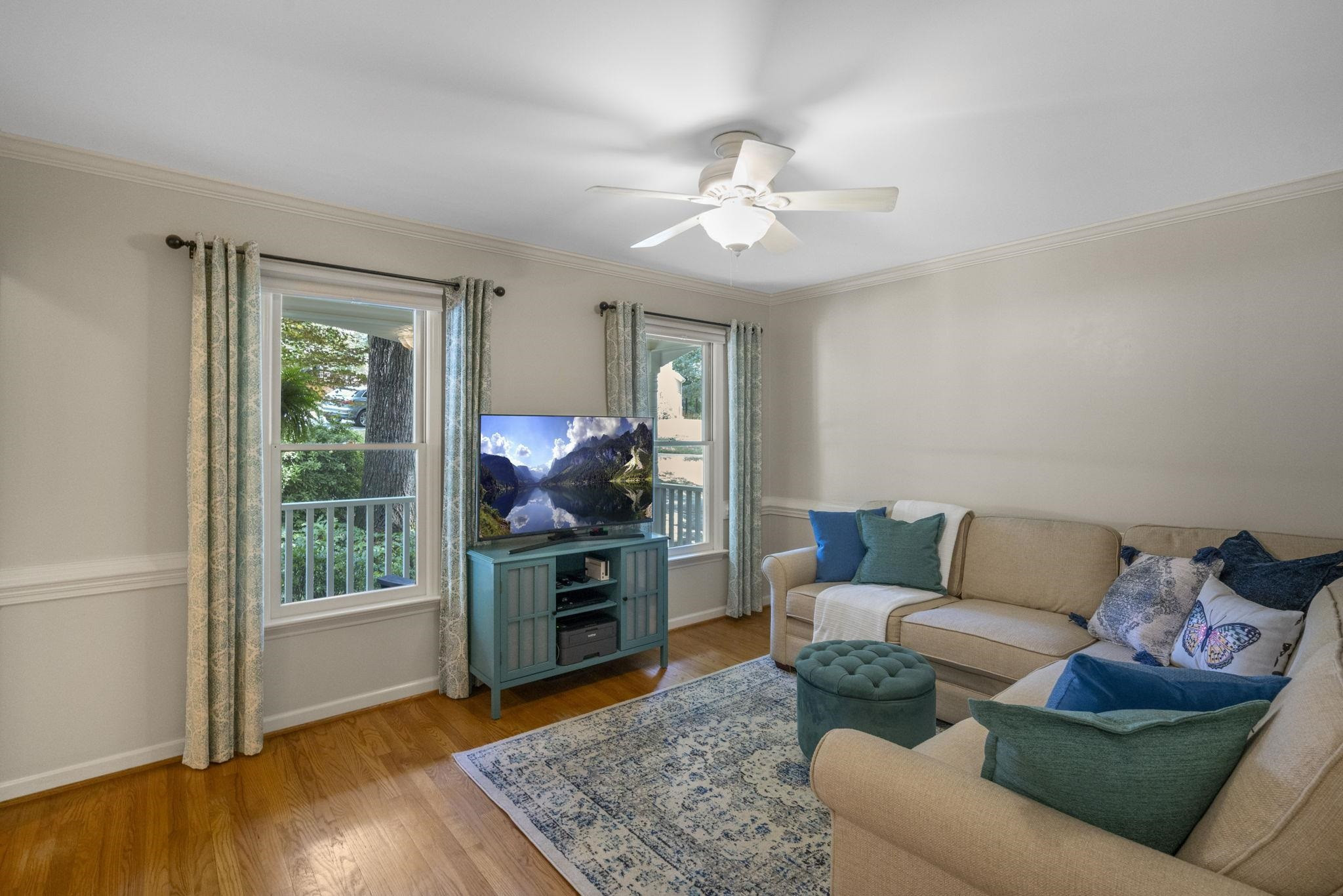 108 Rushingwater Drive Cary, NC 27513 - Photo 15 of 37 a living room with furniture and a flat screen tv