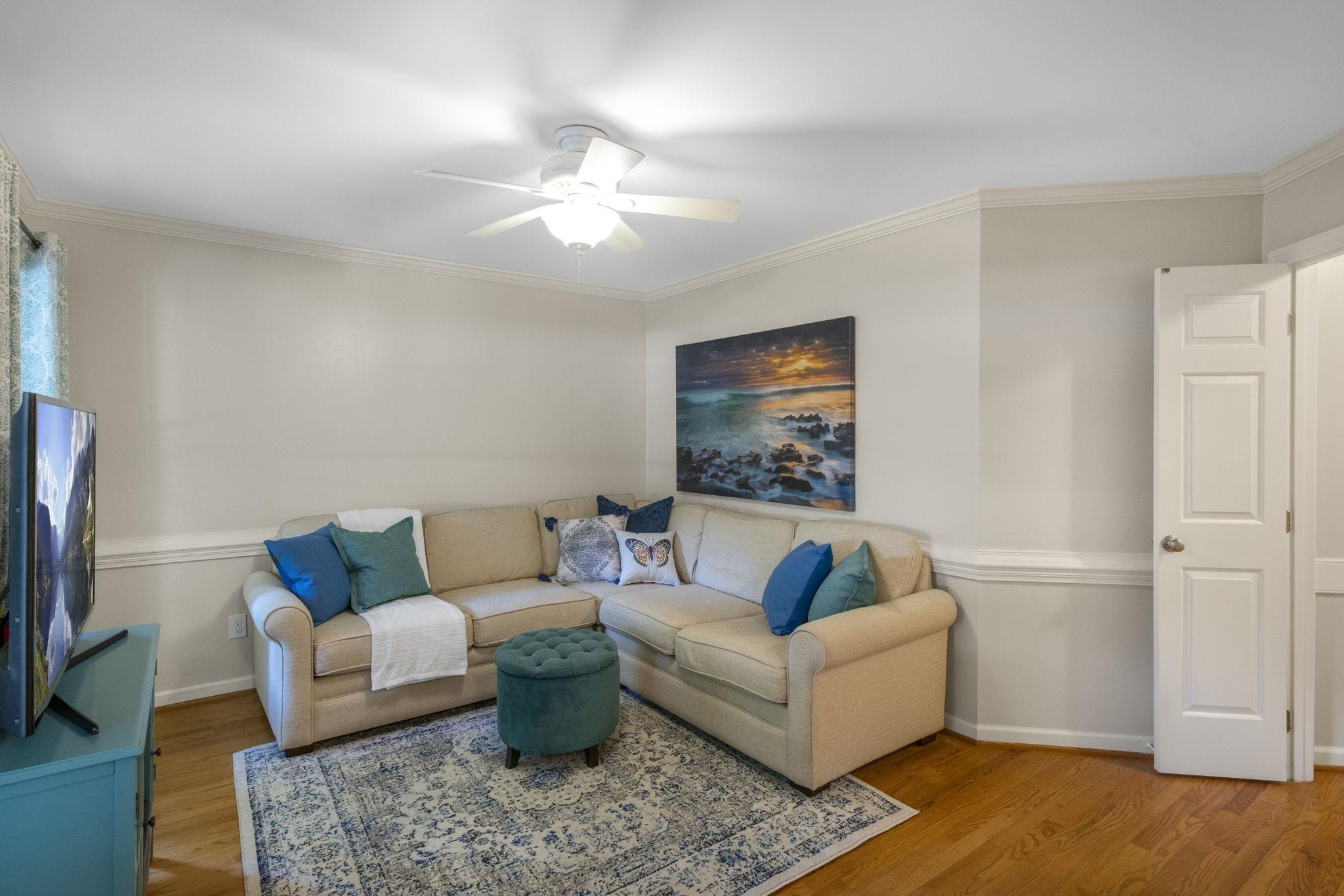 108 Rushingwater Drive Cary, NC 27513 - Photo 16 of 37 a living room with furniture and a flat screen tv