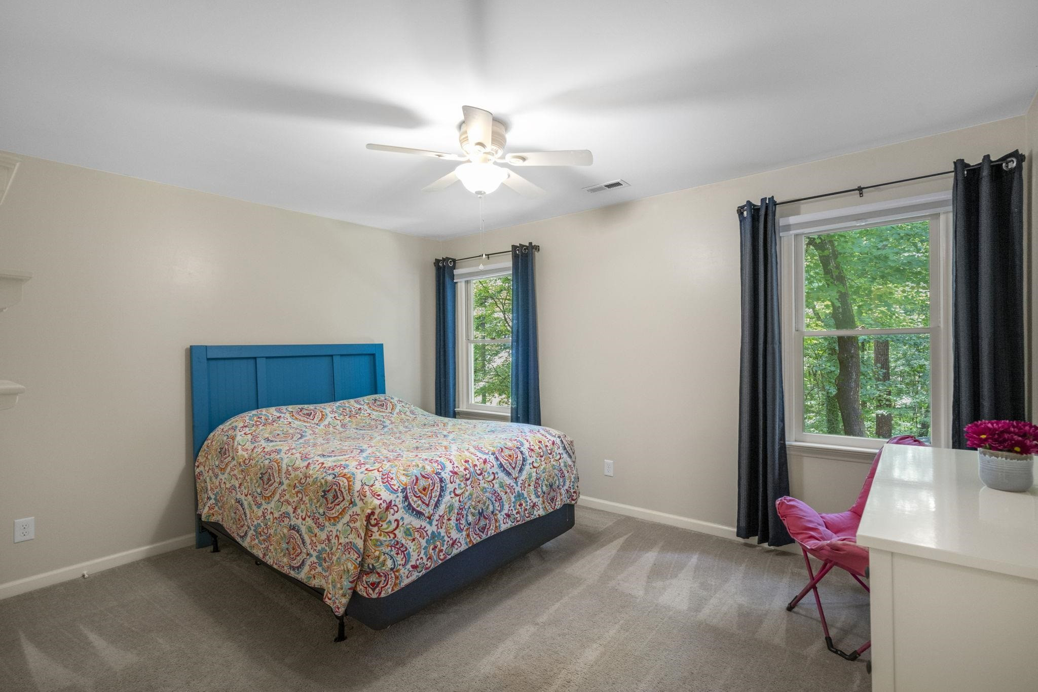 108 Rushingwater Drive Cary, NC 27513 - Photo 20 of 37 a bedroom with a bed chair and a window