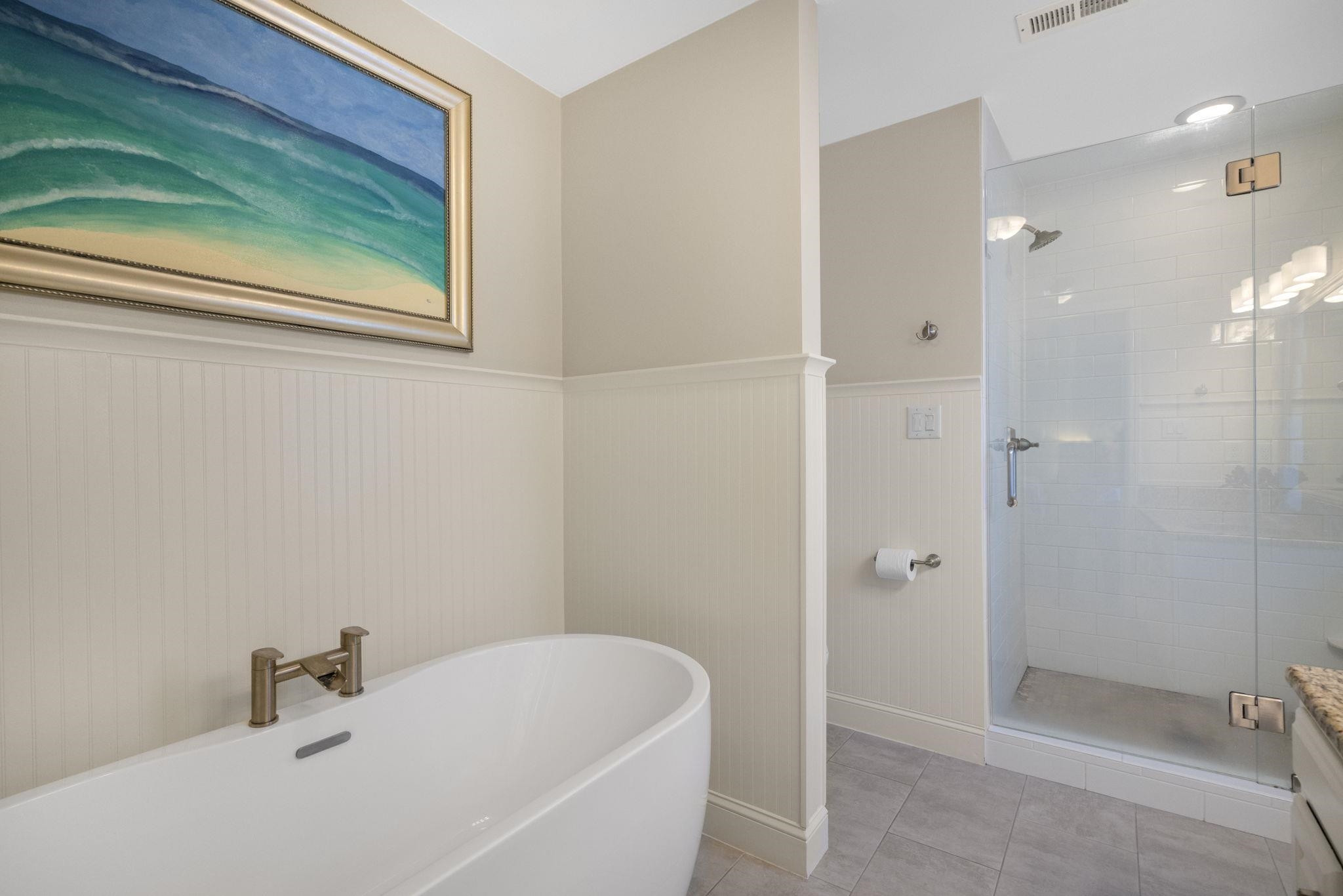 108 Rushingwater Drive Cary, NC 27513 - Photo 27 of 37 a bathroom with a tub and shower