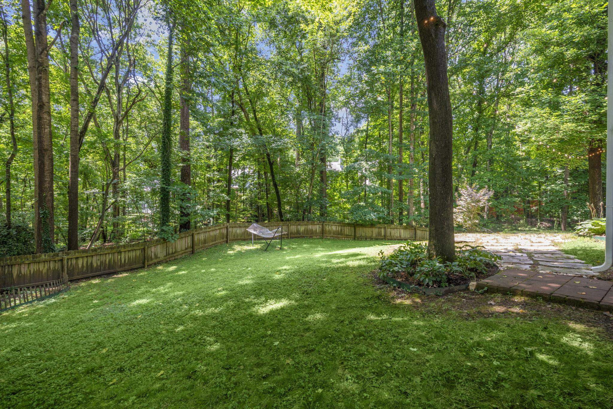 108 Rushingwater Drive Cary, NC 27513 - Photo 37 of 37 a view of lush green forest