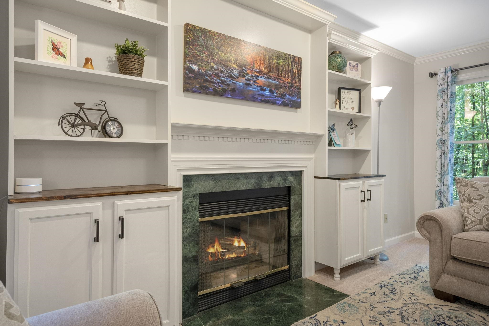 108 Rushingwater Drive Cary, NC 27513 - Photo 6 of 37 a living room with furniture and a fireplace