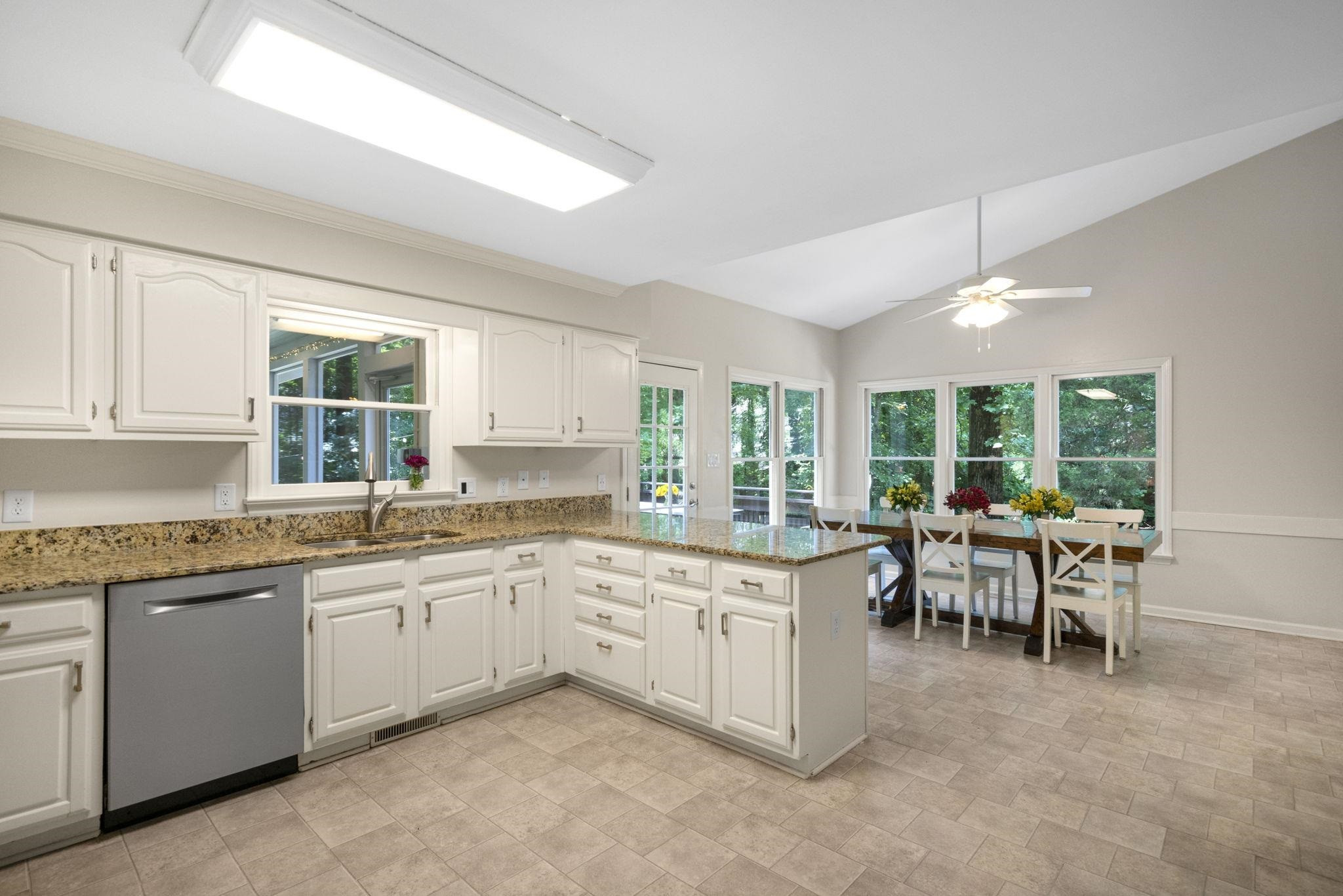 108 Rushingwater Drive Cary, NC 27513 - Photo 7 of 37 a kitchen with sink and window
