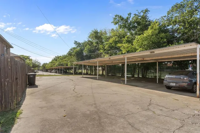 a view of a house with sitting area and garden