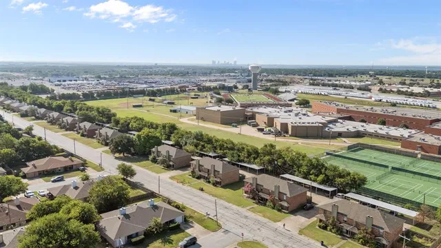 an aerial view of a city with lots of residential buildings