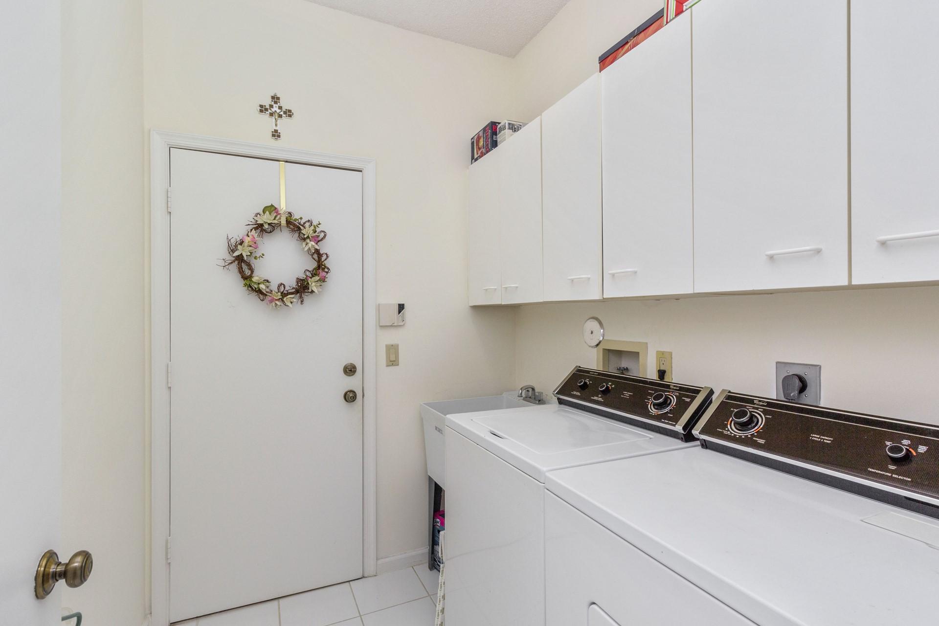 2486 Northwest 63rd Street Boca Raton, FL 33496 - Photo 14 of 26 Interior laundry