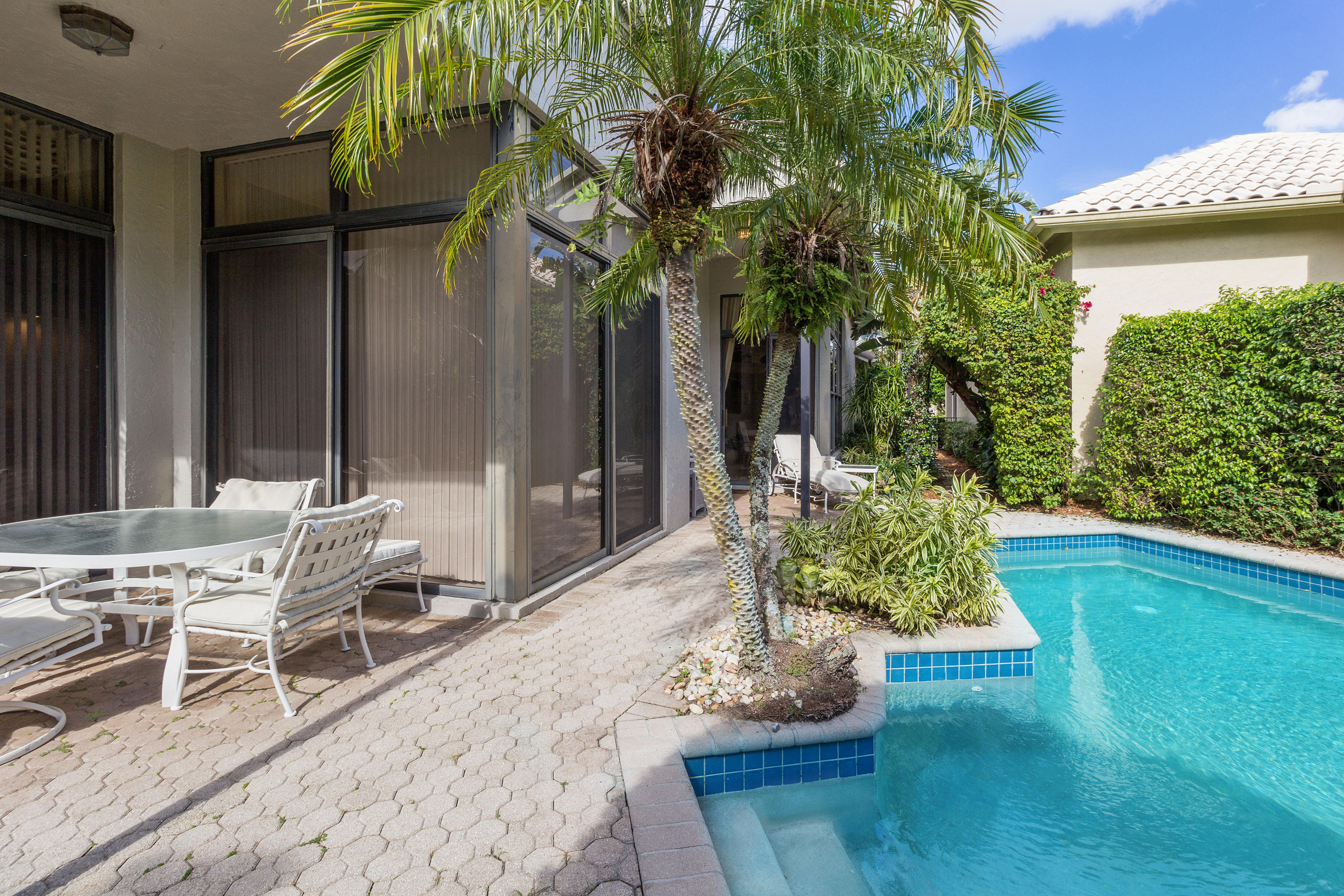 2486 Northwest 63rd Street Boca Raton, FL 33496 - Photo 4 of 26 Pool Plus covered patio