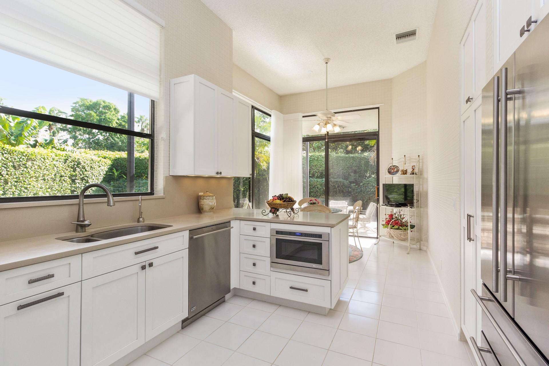 2486 Northwest 63rd Street Boca Raton, FL 33496 - Photo 7 of 26 Kitchen breakfast area