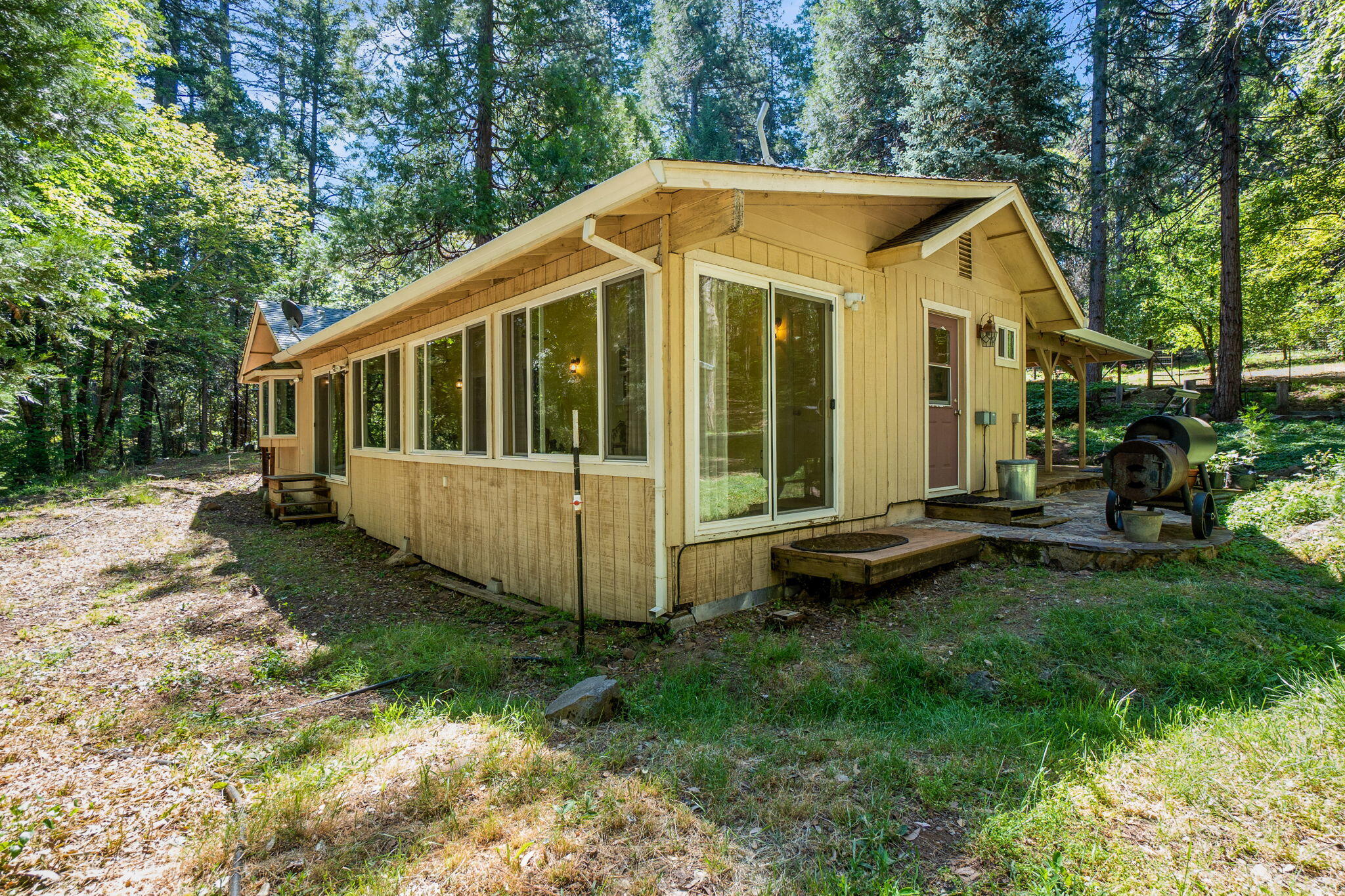 30303 Oak Run To Fern Road Whitmore, CA 96096 - Photo 36 of 75 a view of a house with backyard and sitting area
