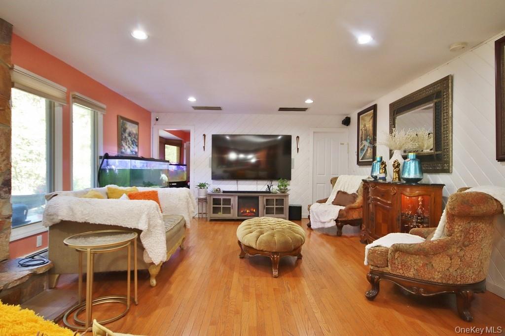 7 Park Place Chester, NY 10918 - Photo 16 of 48 a living room with furniture and a flat screen tv