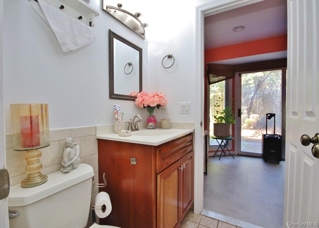 7 Park Place Chester, NY 10918 - Photo 23 of 48 a bathroom with a sink vanity and a mirror