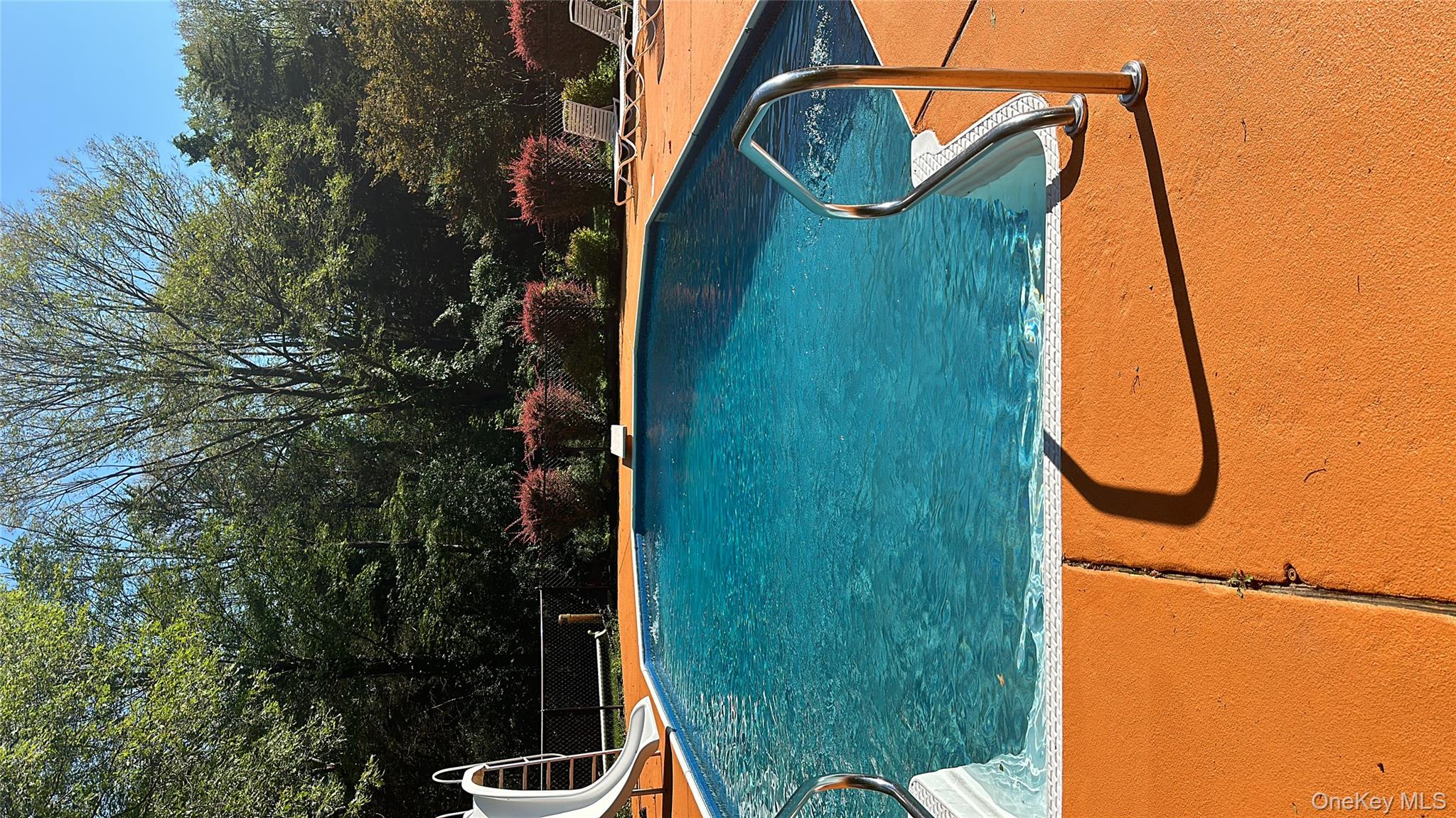 7 Park Place Chester, NY 10918 - Photo 37 of 48 swimming pool with trees in the background