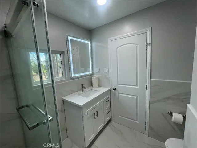 a bathroom with a sink and a toilet