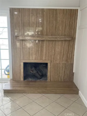 a large kitchen with a stove top oven a sink dishwasher and a refrigerator