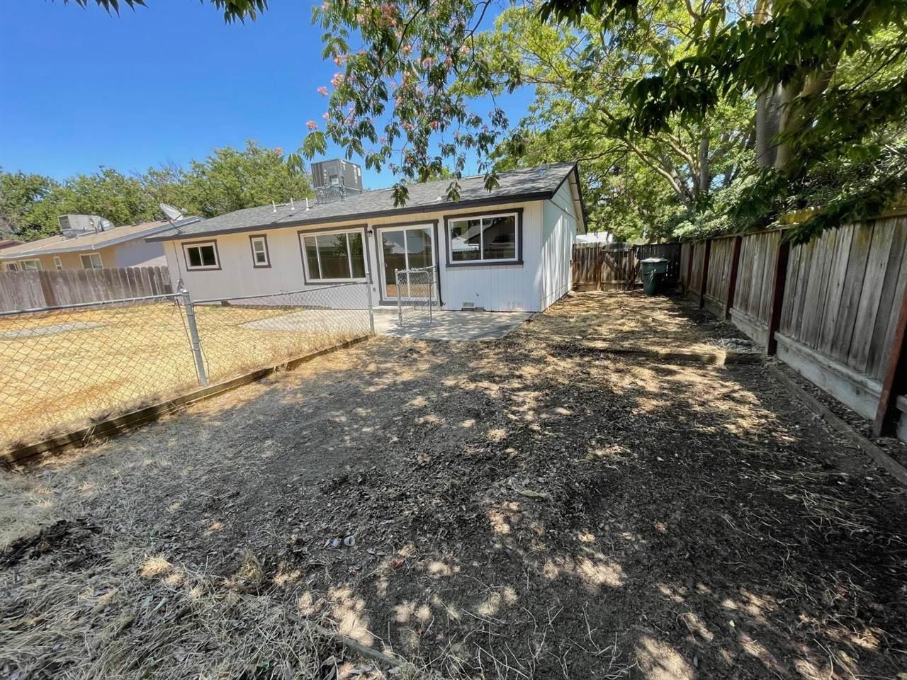 3101 Wyatt Way Modesto, CA 95350 - Photo 17 of 17 a front view of a house with a yard