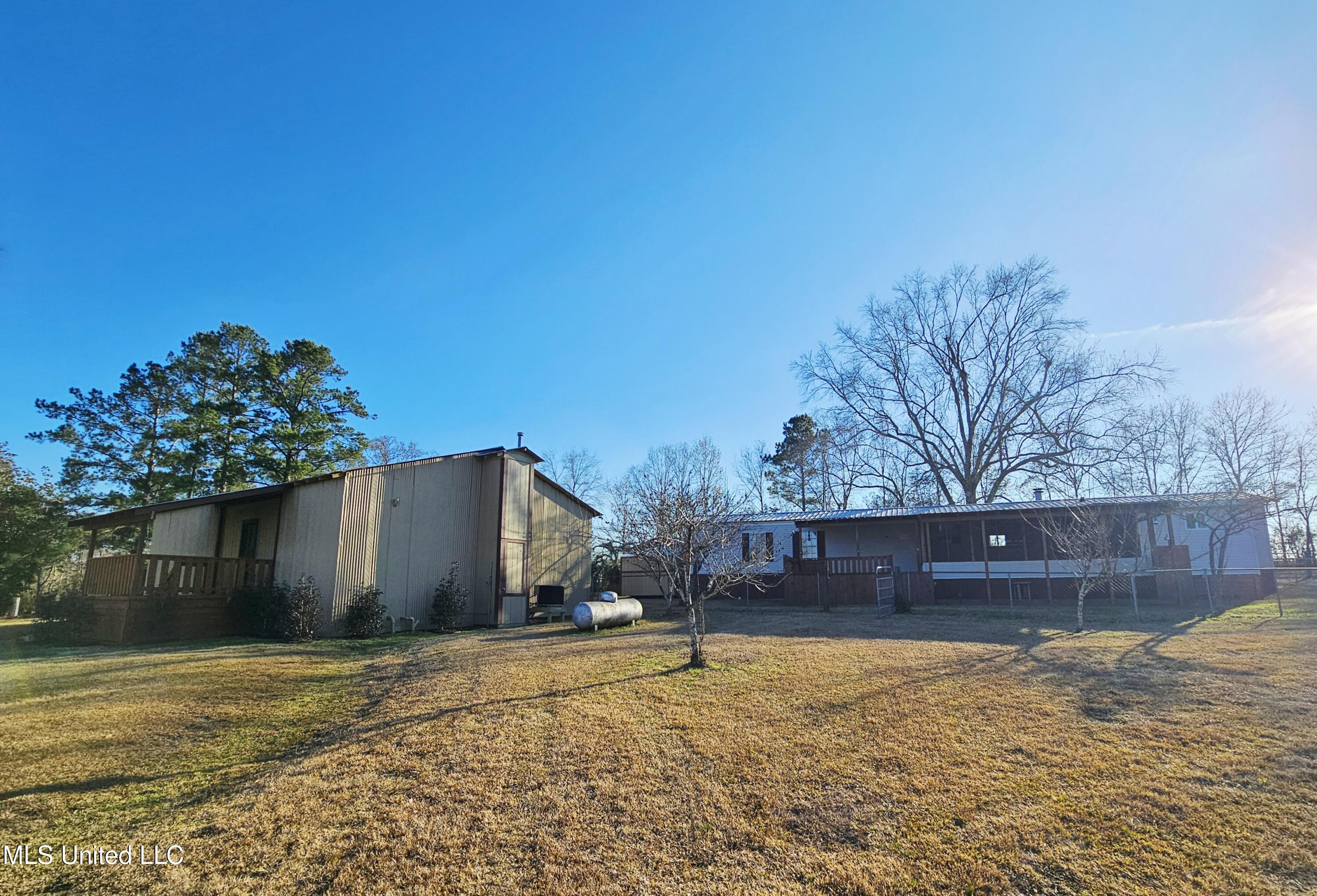 Back of home and additional living space