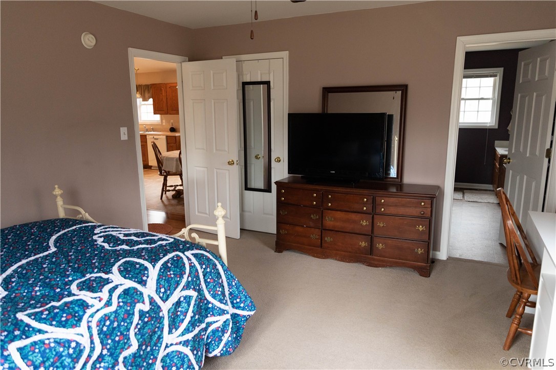11528 Farmville Road Meherrin, VA 23954 - Photo 27 of 48 a bedroom with a bed and a flat screen tv