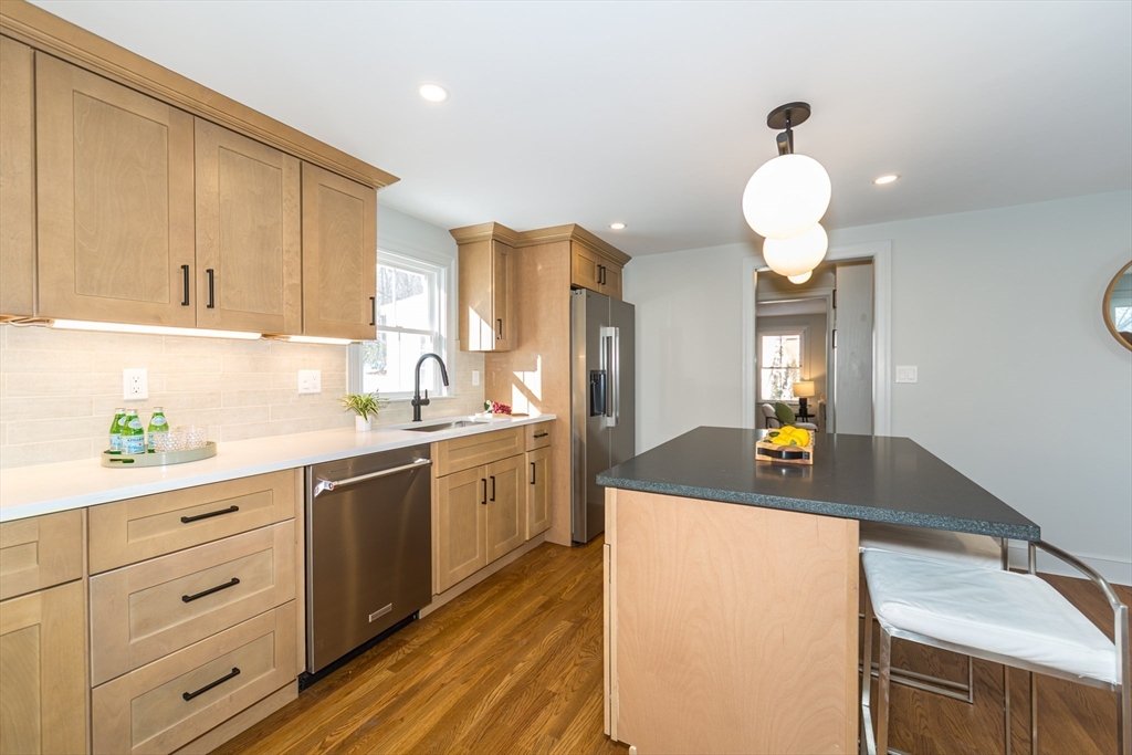 12 Bay State Road Natick, MA 01760 - Photo 12 of 35 a kitchen with cabinets a sink and appliances