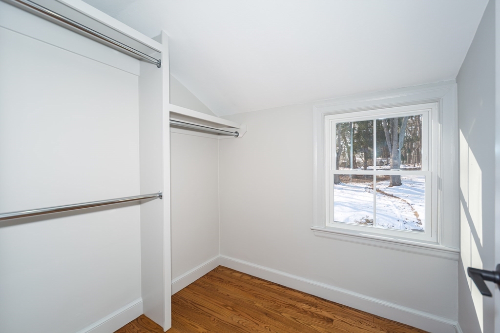 12 Bay State Road Natick, MA 01760 - Photo 21 of 35 a view of a room with wooden floor and windows