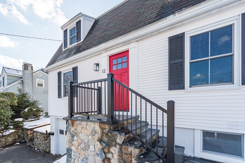 12 Bay State Road Natick, MA 01760 - Photo 3 of 35 a view of a house with wooden fence