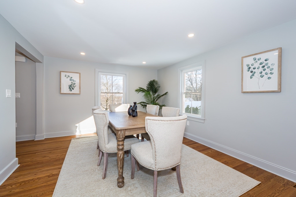 12 Bay State Road Natick, MA 01760 - Photo 9 of 35 a view of a dining room with furniture window and wooden floor