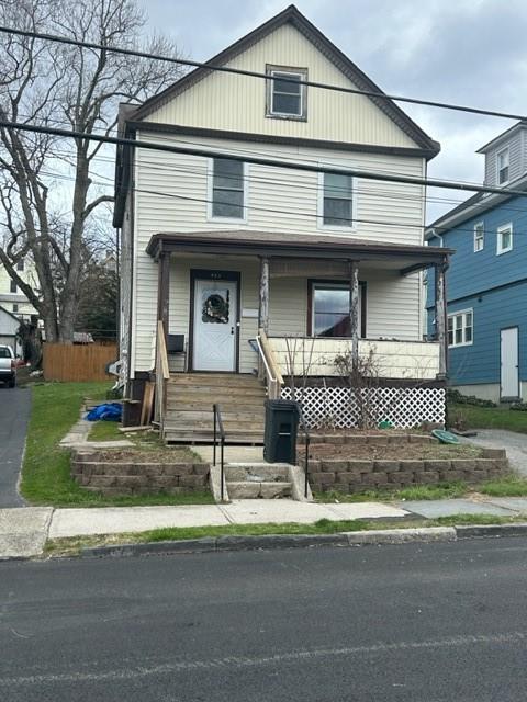 425 Simpson Place Peekskill, NY 10566 - Photo 1 of 1 View of front of property featuring covered porch