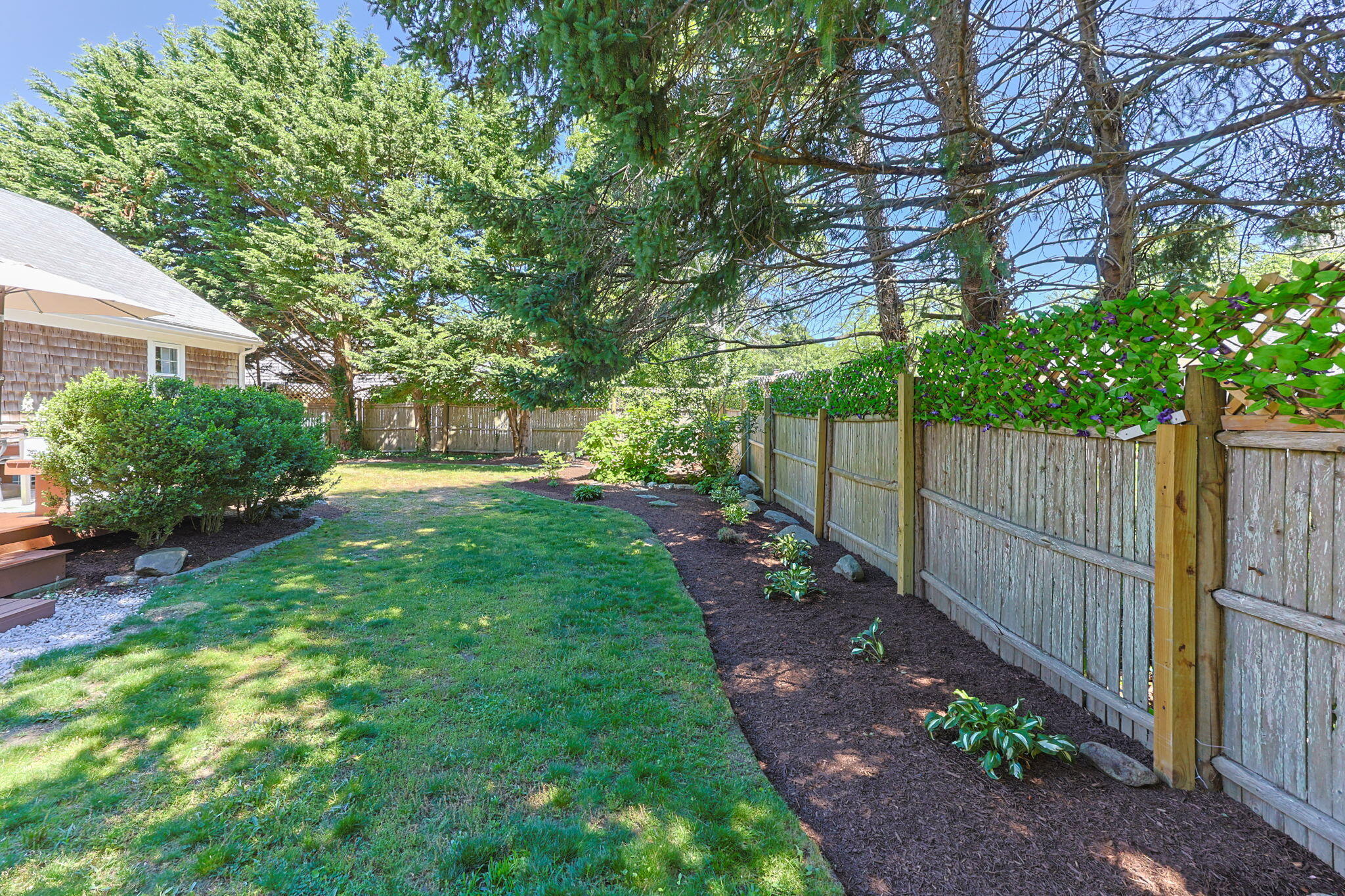 74 Taft Road West Yarmouth, MA 02673 - Photo 23 of 31 back fence plantings