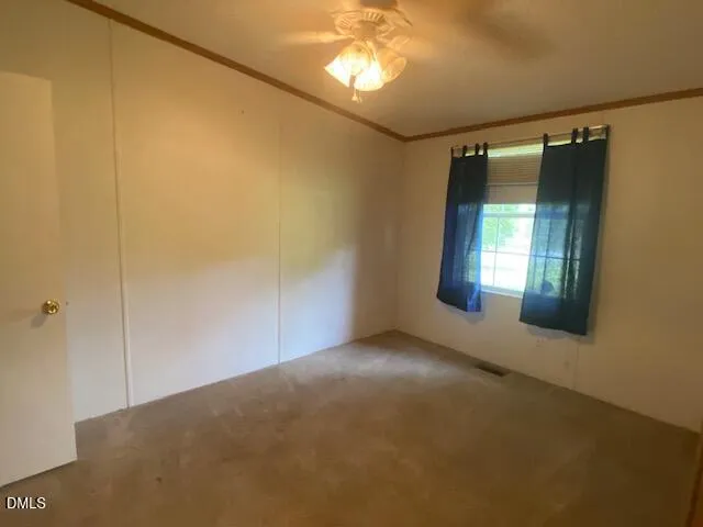 a view of empty room with window