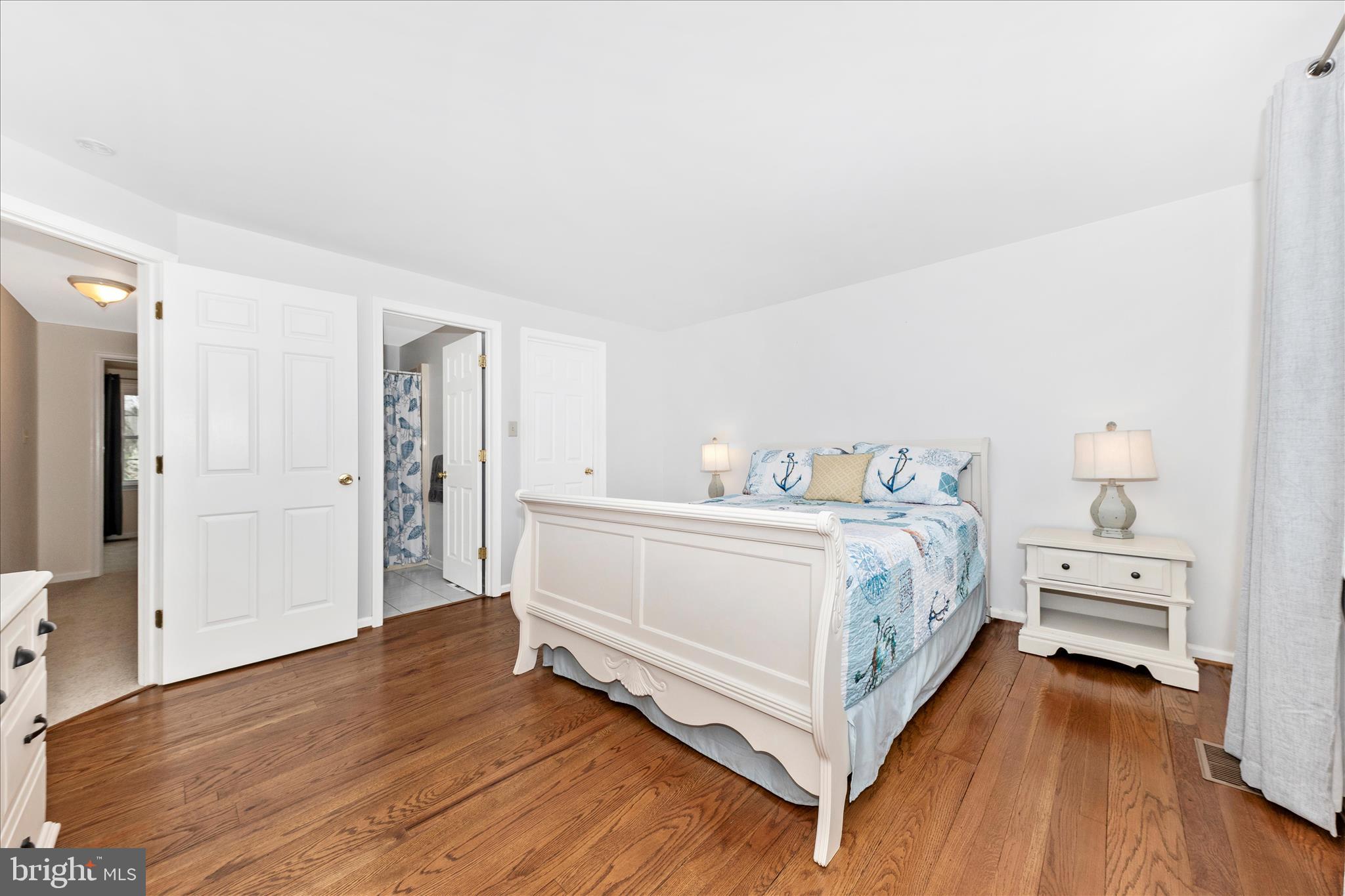 8226 Red Wing Court Frederick, MD 21701 - Photo 18 of 45 a bed room with bed and a window