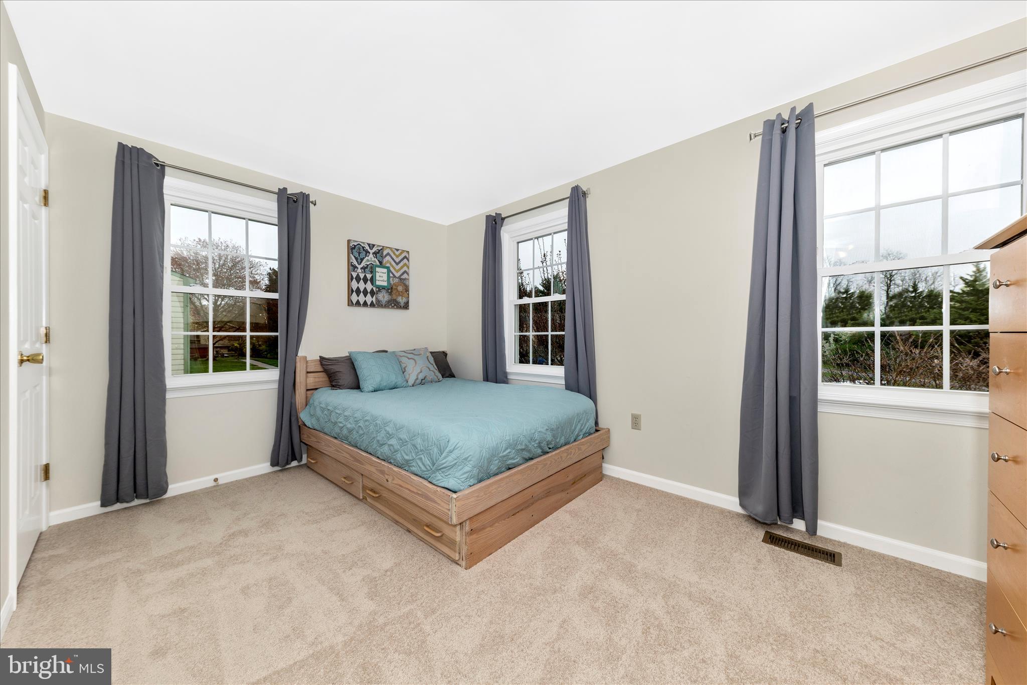 8226 Red Wing Court Frederick, MD 21701 - Photo 24 of 45 a bedroom with a bed and window