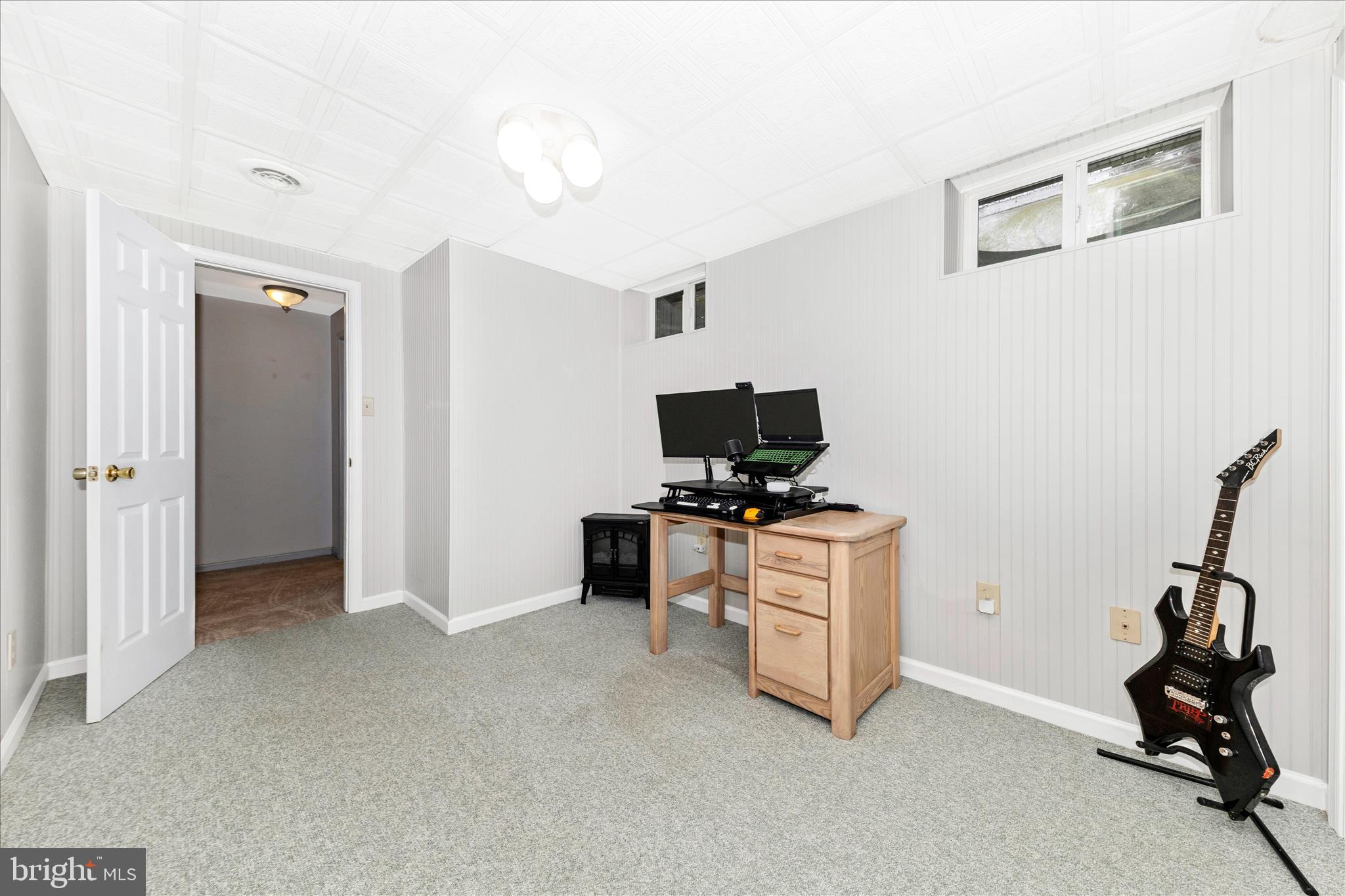 8226 Red Wing Court Frederick, MD 21701 - Photo 32 of 45 a view of workspace with flat screen tv