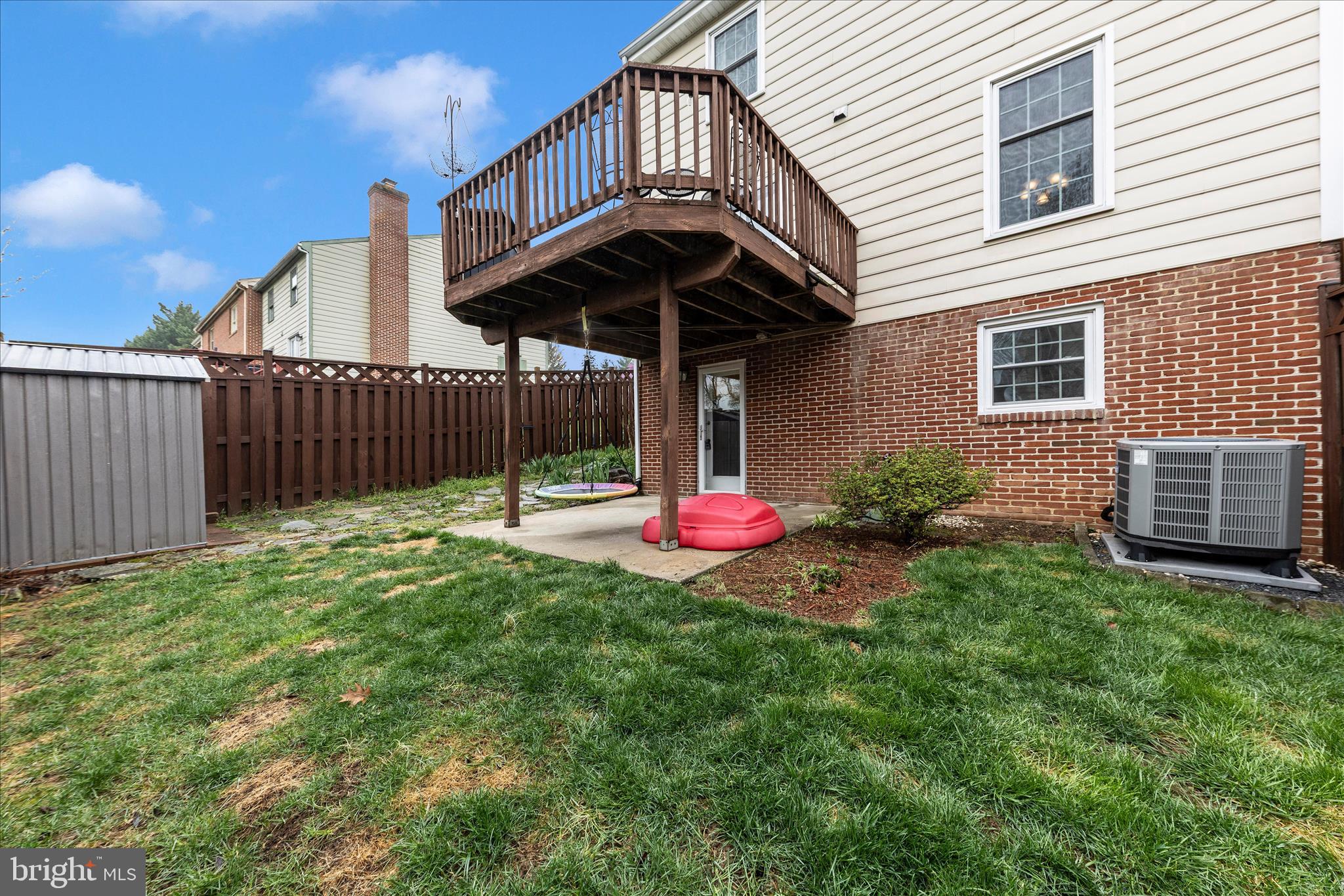 8226 Red Wing Court Frederick, MD 21701 - Photo 39 of 45 a backyard of a house with table and chairs