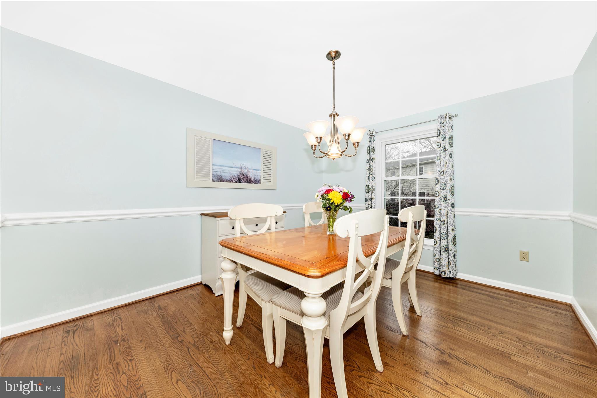 8226 Red Wing Court Frederick, MD 21701 - Photo 5 of 45 a view of a dining room with furniture and wooden floor