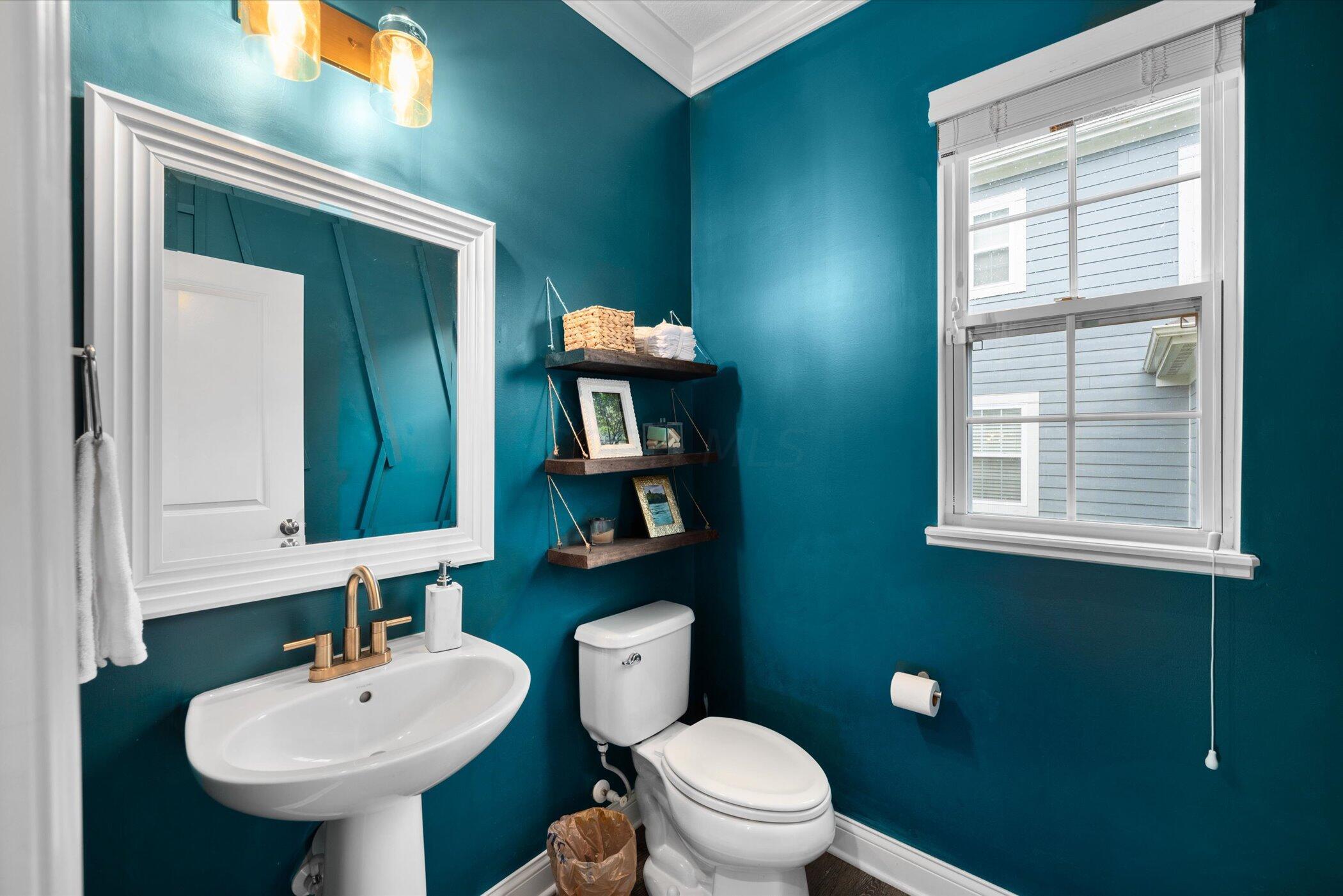 706 Bigham Ridge Boulevard Westerville, OH 43081 - Photo 13 of 62 The powder room is richly accented