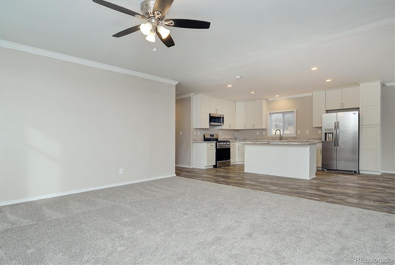 16554 Rocky Mountain Road Salida, CO 81201 - Photo 7 of 33 a view of kitchen with wooden floor