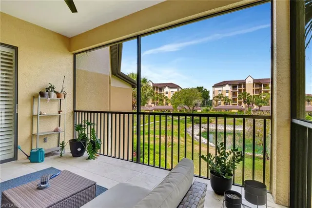a view of a balcony with chairs