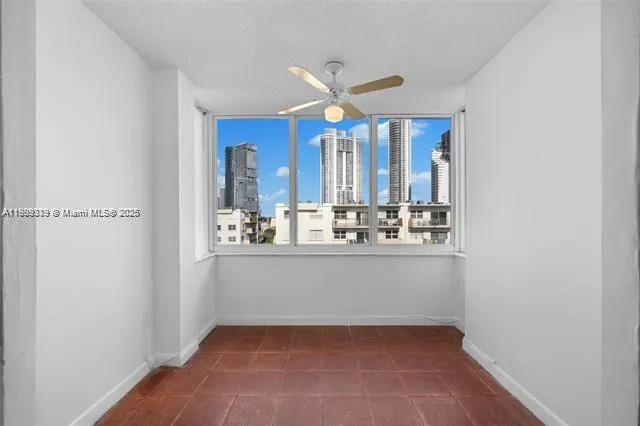 a view of bathroom with sink and mirror