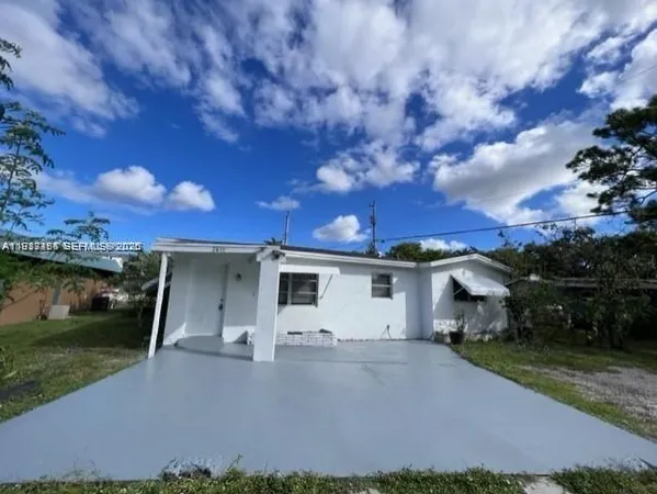 a view of a terrace with a yard