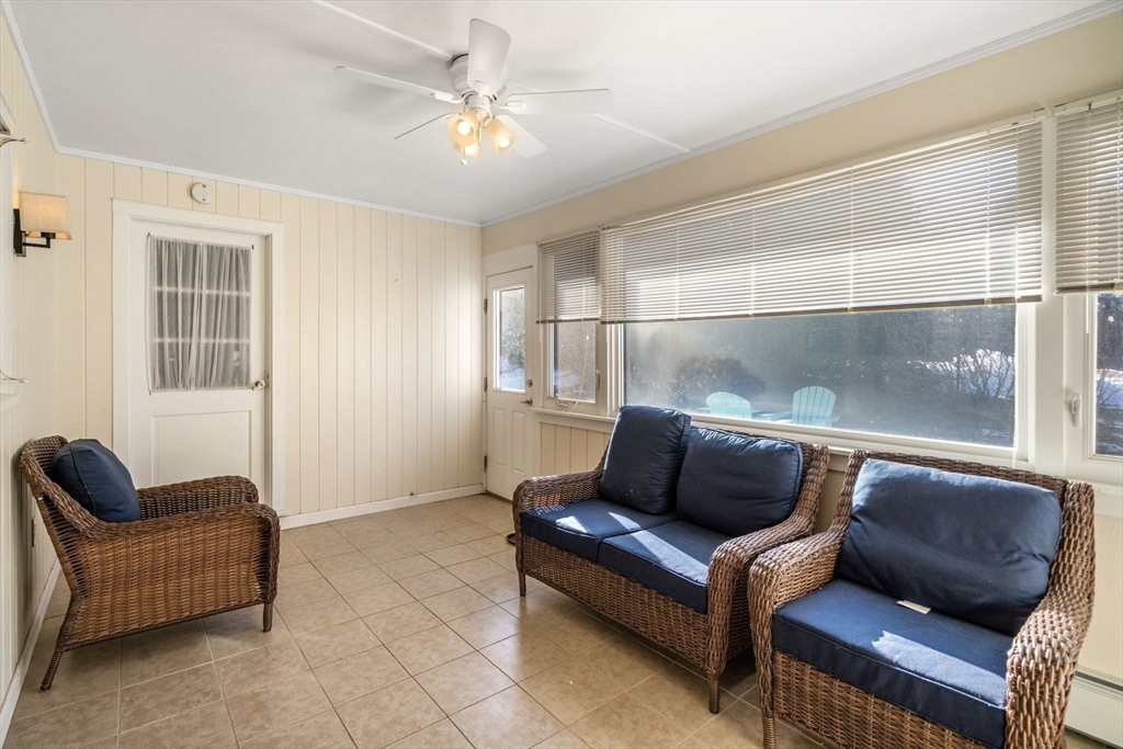 6 Wallace Road Sturbridge, MA 01566 - Photo 20 of 22 a living room with furniture and a potted plant