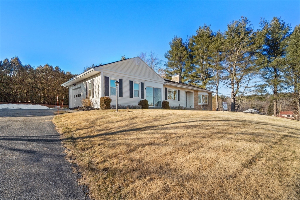 6 Wallace Road Sturbridge, MA 01566 - Photo 22 of 22 a front view of a house with a yard