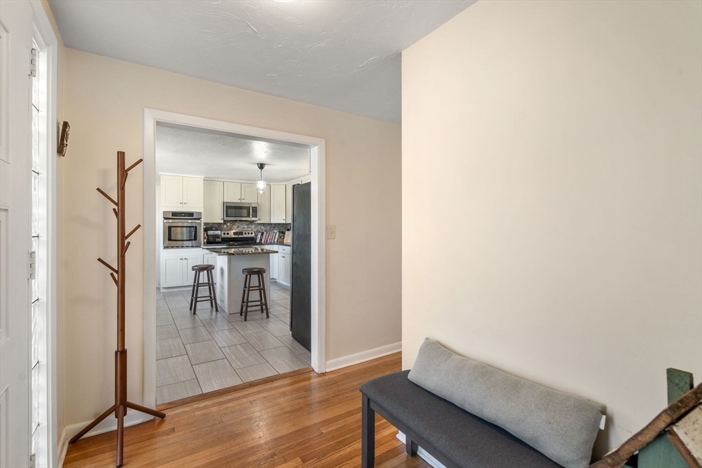 6 Wallace Road Sturbridge, MA 01566 - Photo 6 of 22 a view of a dining room with furniture and wooden floor