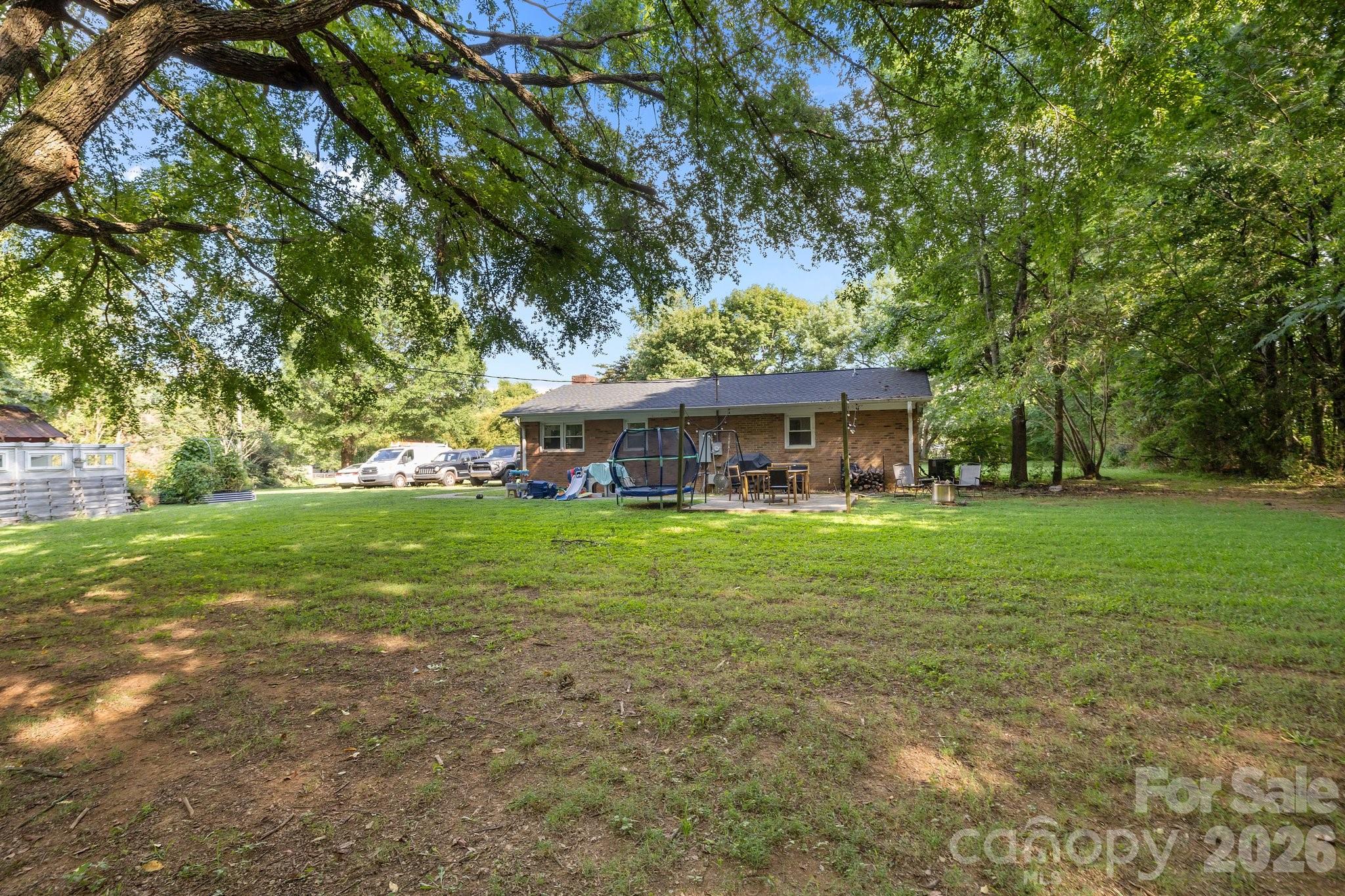 1108 Willoughby Road Monroe, NC 28110 - Photo 29 of 48 a front view of a house with a yard
