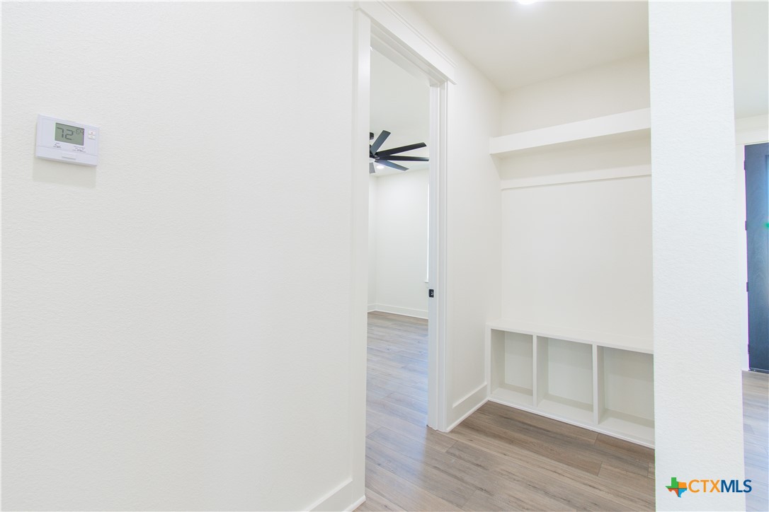 4245 Stringtown Road Temple, TX 76501 - Photo 15 of 25 a view of a room with wooden floor