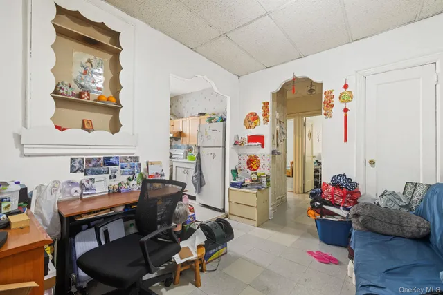 a view of an empty room with a window