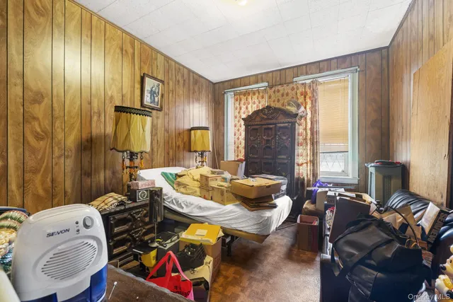 a room with furniture and a flat screen tv