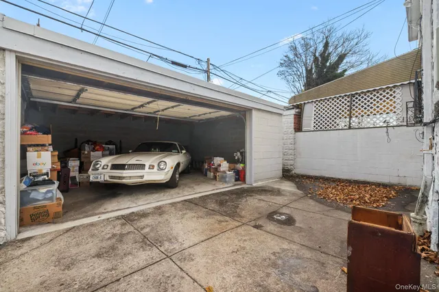a view of a chairs and table in the patio