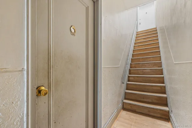 a bathroom with a sink mirror toilet and bathtub
