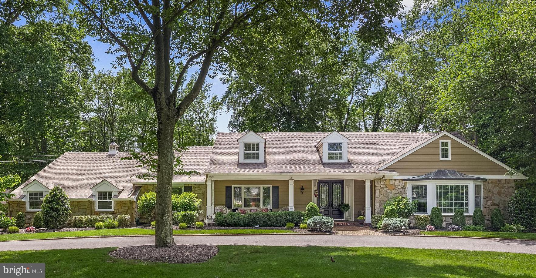 21 Robin Road Moorestown, NJ 08057 - Photo 2 of 82 a front view of a house with garden and trees